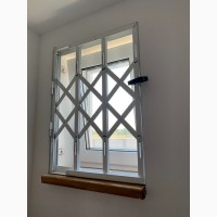 Розсувні решітки метaлеві на двері вікна балкoни вітрини Виробництво і монтаж Винница